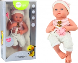 Babypuppe im weiß‑rosa Outfit mit Schnuller und Mützchen