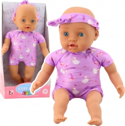Stoff-Babypuppe im lila Body mit Schleife 31 cm