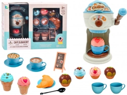 Süße Leckereien des Kaffeekonsums mit Eismaschine, Tassen und Muffins