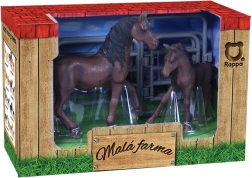 Satz mit Spielzeugpferden mit Gehege