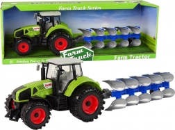 Traktor mit Pflug auf Schwungrad