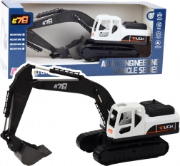 Großer Kettenbagger mit Metallschaufel und beweglichen Gelenken