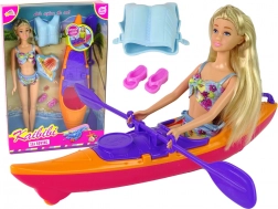Set mit Puppe und orangem Kajak mit Zubehör