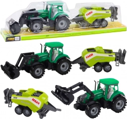 Grüner Traktor mit Frontlader und kompatibler Ballenpresse