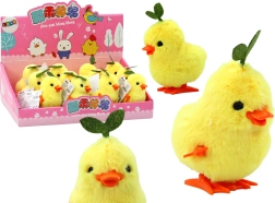 Gelbes aufziehbares Küken mit Blättchen