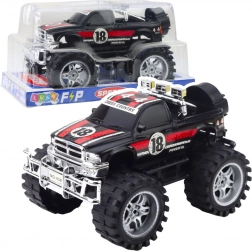 Geländewagen mit Hinterradantrieb, große Räder, rot‑schwarz