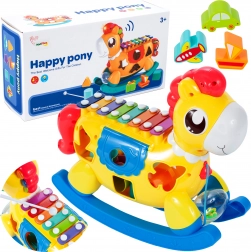 Schaukelpferd mit Formensortierer und Becken