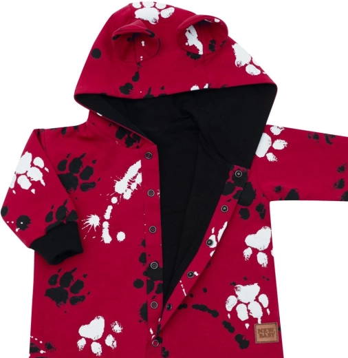 Einfaches Anziehen dank Druckknöpfen über die gesamte Länge