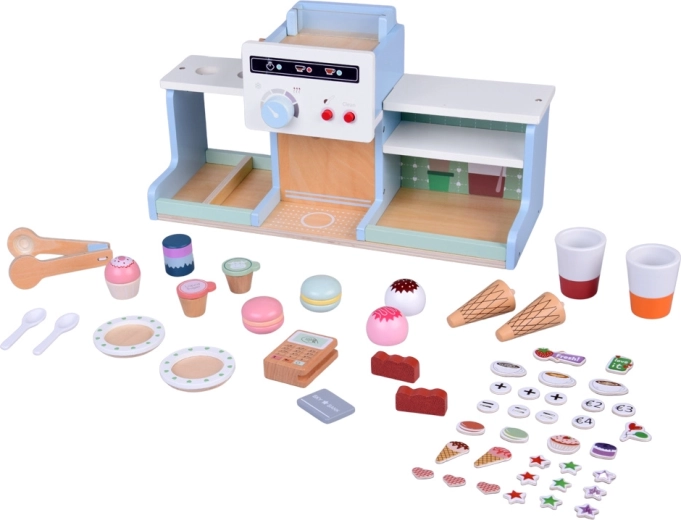 Umfangreiches Set aus Desserts und Zubehör