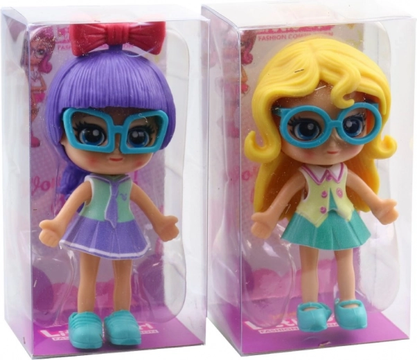 Stylische Puppe mit Brille
