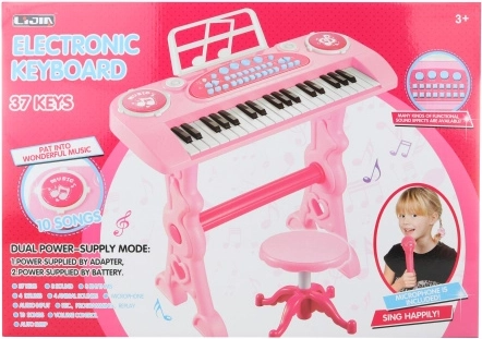Rosa Kinderklavier mit Adapter