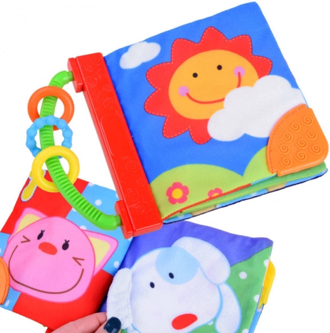 Weiches raschelndes Stoffbuch für Babys mit Beißringen und Ringen