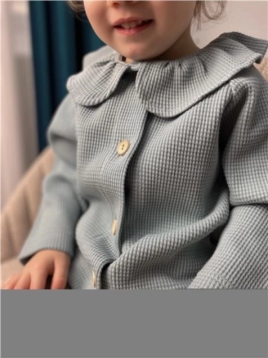 Einfaches Anziehen dank Knöpfen