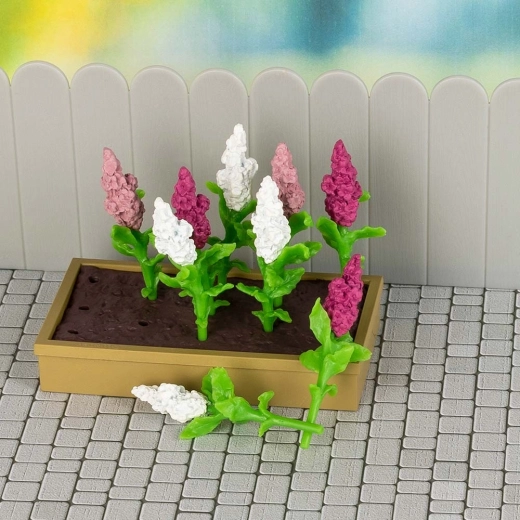 Blühender Blumenkasten und Blumen zum Arrangieren von Szenen