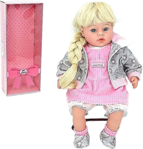 Puppe Mädchen mit Zopf in einer Box