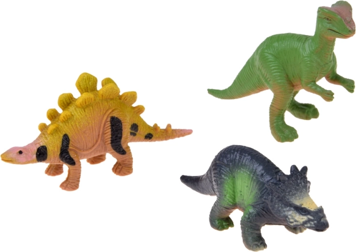 3 Dinosaurierfiguren und leuchtende Sticker