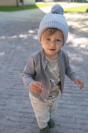 Stylischer Bommel oben