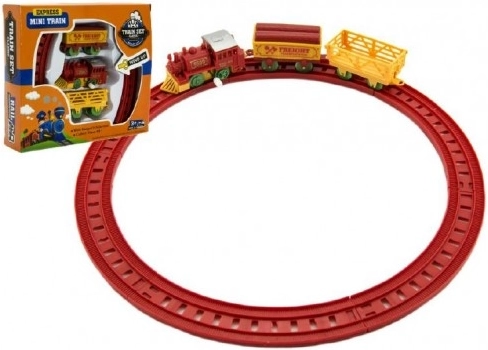 Uhrwerkzug mit zwei Wagen und Gleisen