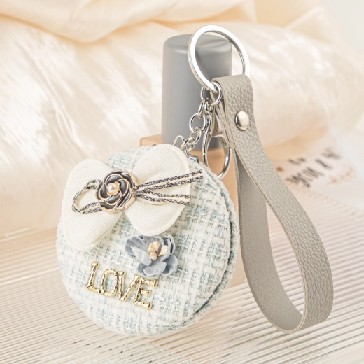 Taschenspiegel Blaue Umarmung mit Schleife und LOVE-Aufschrift