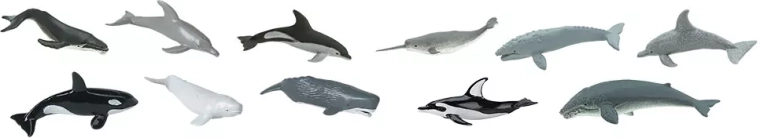 Mini-Figuren von Walen und Delfinen mit Fokus auf Details