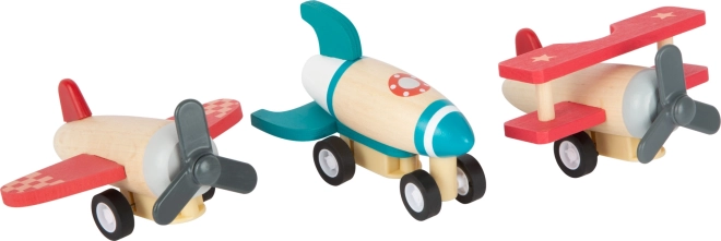 Holz-Aufziehspielzeug – Flugzeuge und Rakete