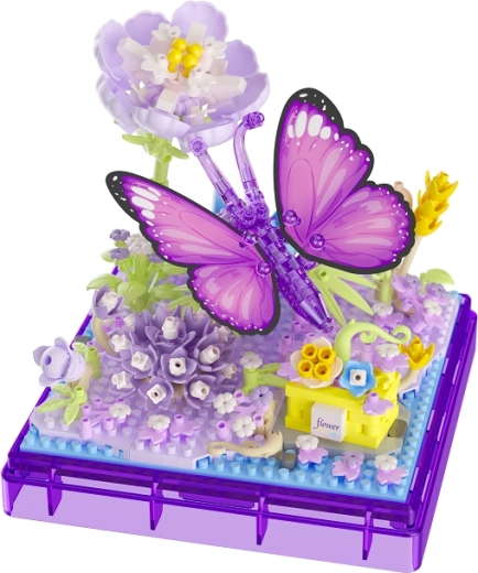 Dekoratives Modell eines Schmetterlings auf Blumen
