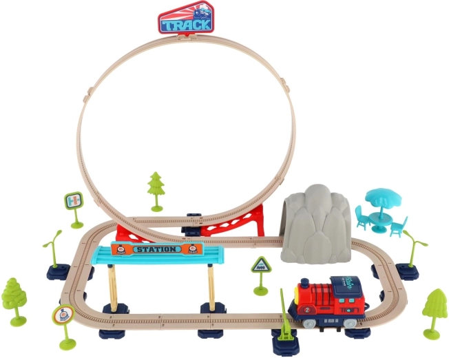 Strecke mit Brücke und Bahnhof