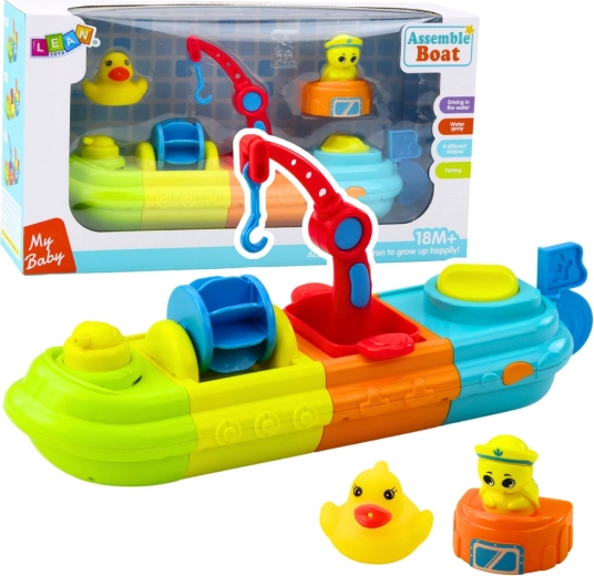 Badespielzeug Boot mit bunten Elementen, Kran, Haken, Entchen und Schildkröte