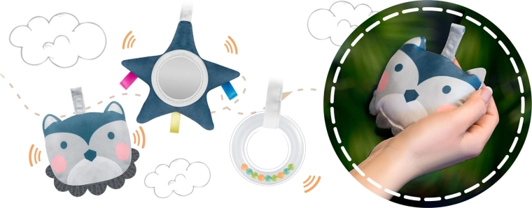 Spielbogen mit Spielzeugen zur Sinnesförderung