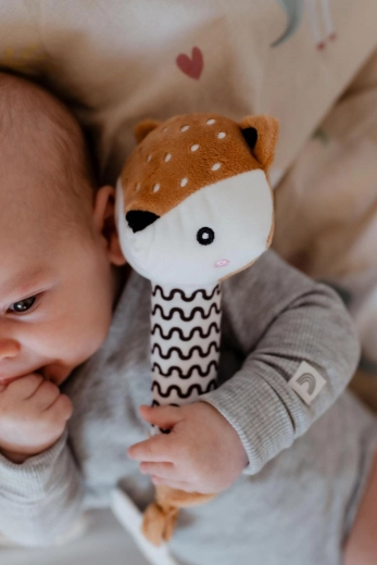 Sanfte Rassel zur Förderung des Hörsinns