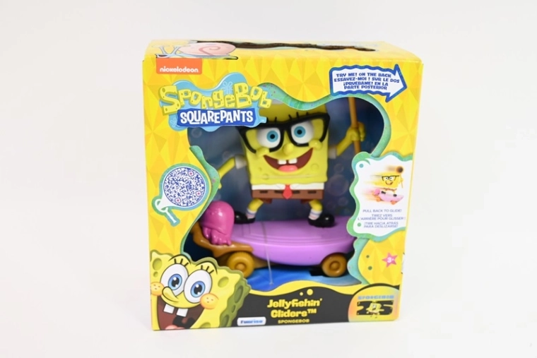 SpongeBob Schwammkopf Figur auf Skateboard mit Qualle