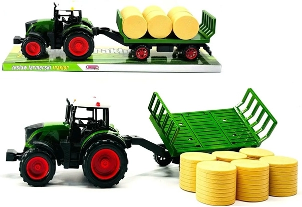 Traktor mit Anhänger und Strohballen Gazelo