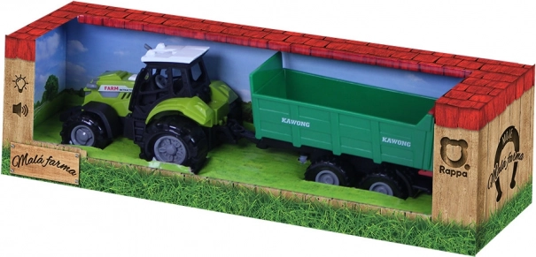 Traktor mit Geräuschen und Licht mit grünem Anhänger