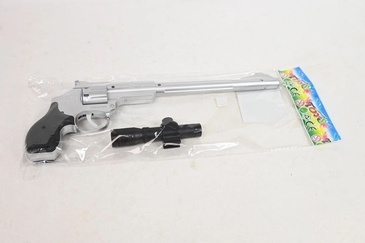 Lange silberne Kinder-Zündplättchenpistole mit Zielfernrohr