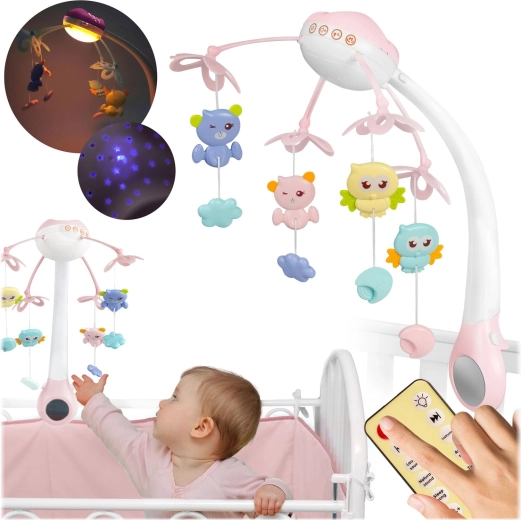 Rosa Mobile über dem Kinderbett mit Projektor und Fernbedienung