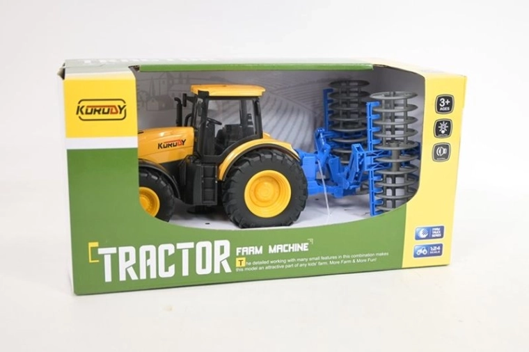 Traktor mit ansteckbarem Pflug mit Licht und Sound