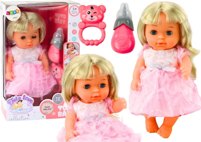 Puppe im rosa Kleid mit Zubehör und Geräuschen