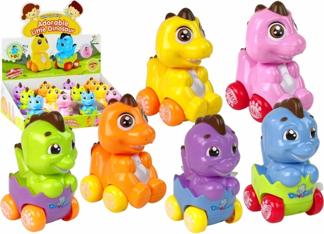 Aufzieh-Dinosaurier im Ei auf Rädern