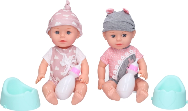 Baby mit Töpfchen und Flasche