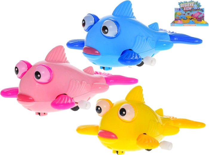 Bunte Kunststoff-Fischfigur mit Aufziehschlüssel