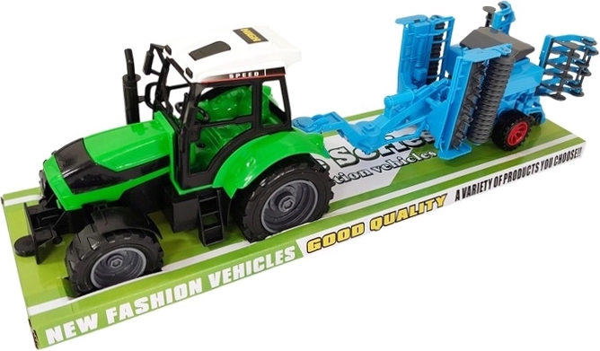 Kindertraktor mit zusätzlicher landwirtschaftlicher Maschine