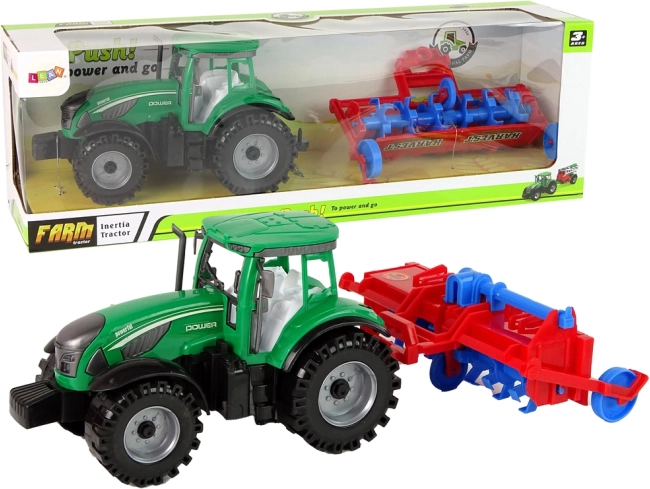 Traktor mit Pflug mit Reibungsantrieb – rot