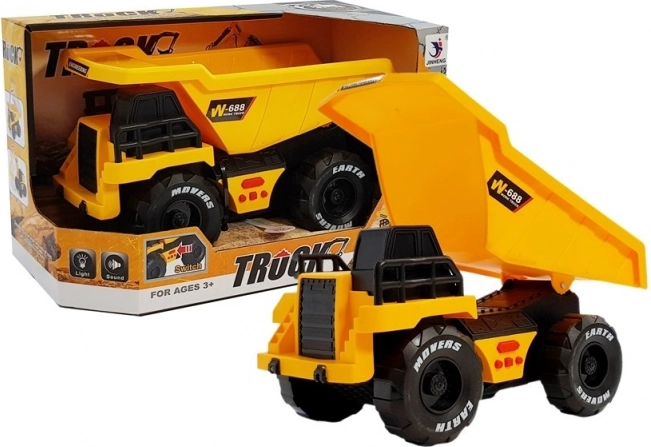 Gelber Kinder-Kipper mit Reibungsantrieb, Lichtern und Geräuschen