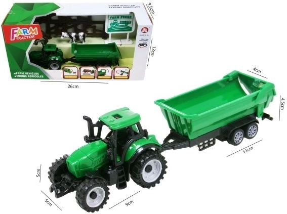 Grüner Traktor mit Anhänger und Zubehör