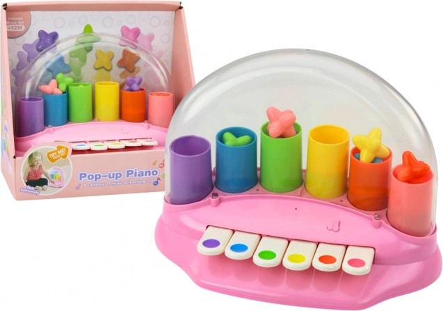 Interaktives rosa Klavier mit herausschießenden Sternchen