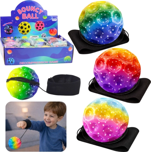 Sensorischer Ball an Gummischnur mit Armband, regenbogenfarben, 6 cm