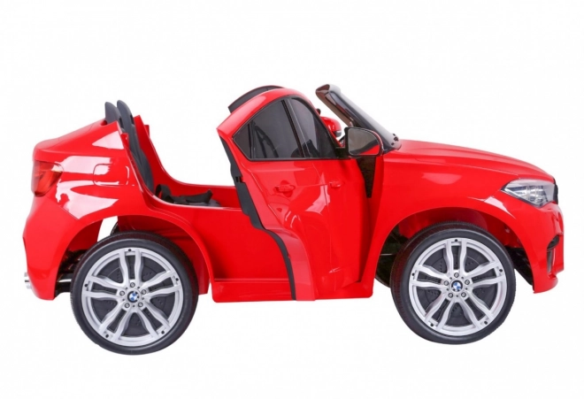 BMW X6M XXL pro 2 Kinder Rot + Fernbedienung + Ökoleder + Sicherheitsgurte + Langsamer Start + MP3 USB + LED-Leuchte