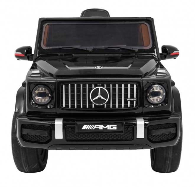 Mercedes AMG G63 für Kinder Lack schwarz + Fernbedienung + MP3 LED + langsamer Start + EVA + Gurte