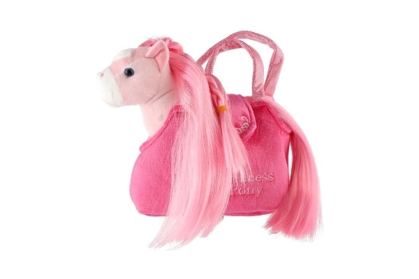 Pinker Plüsch Einhorn in Handtasche