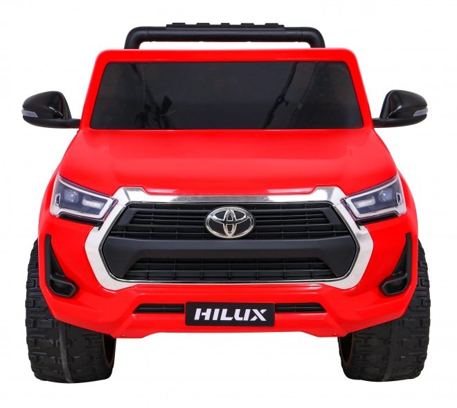 Toyota Hilux Batterie Kinderauto Rot + Allradantrieb 4x4 + Fernbedienung + 2 Gepäckträger + MP3-Radio + LED-Diode